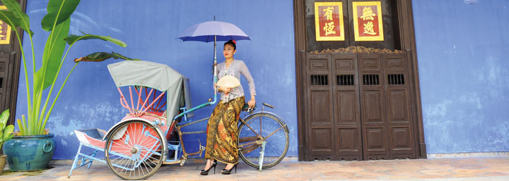 Cheong-Fatt-Ze-Haus in Penang mit Frau & Rikscha