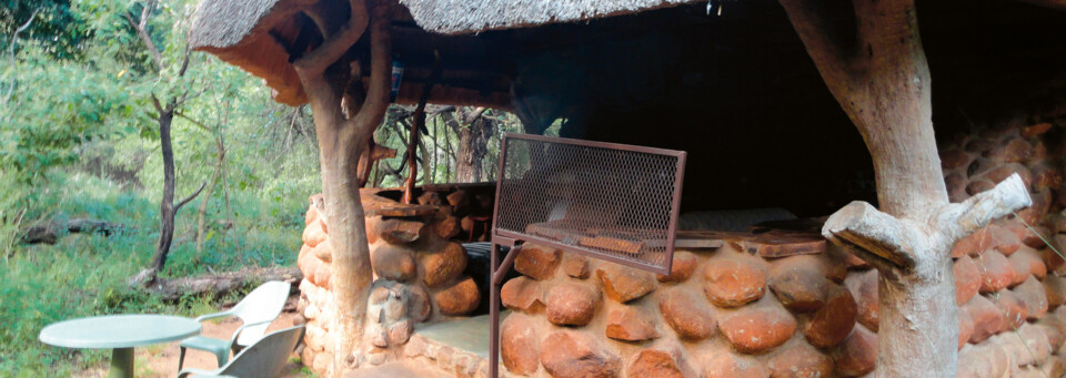Außenansicht der Hütte im Stone Camp Mkhaya Game Reserve