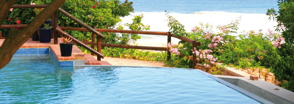 Pool mit Blick aufs Meer The Boardwalk Lodge im Wilderness Nationalpark