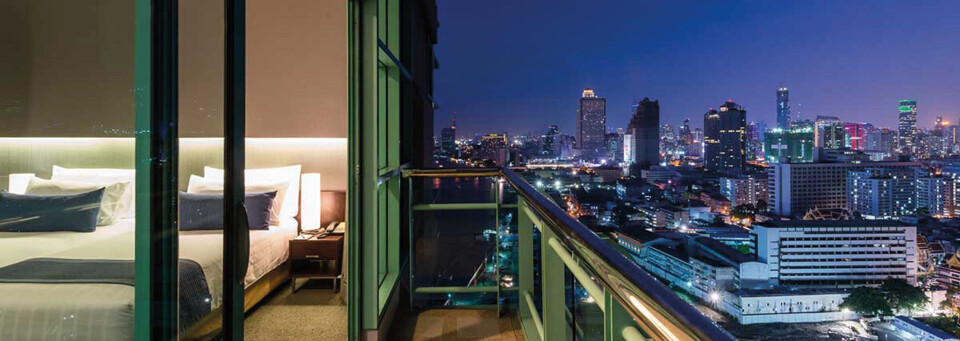 Grand-Ziummerbeispiel mit Stadtblick des Chatrium Hotel Riverside Bangkok