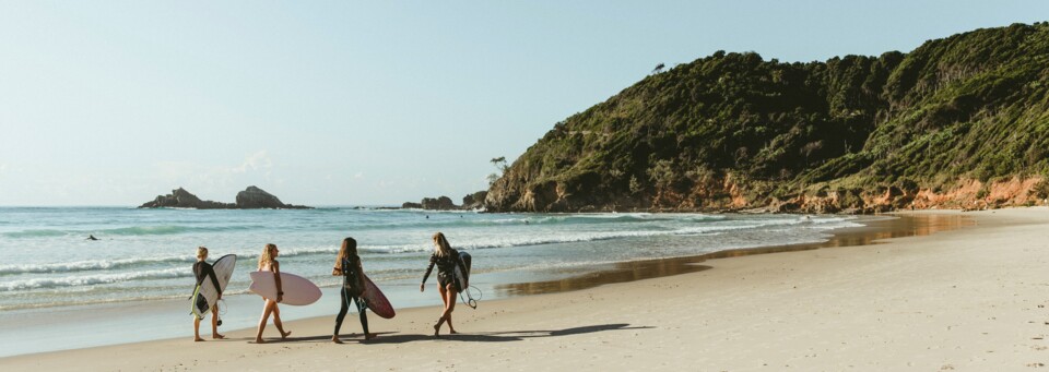 Surfer am Strand, Byron Bay