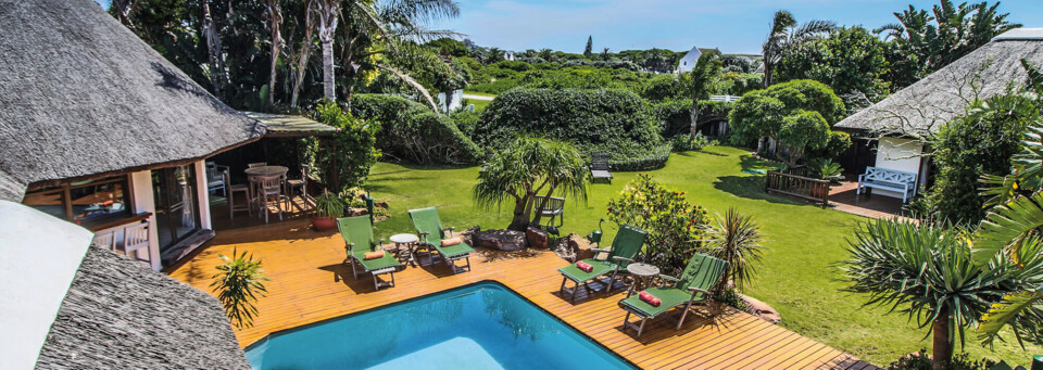 Garten des Sandals Guest House in St. Francis Bay