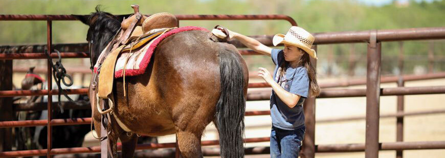 Tanque Verde Ranch Kind mit Pferd
